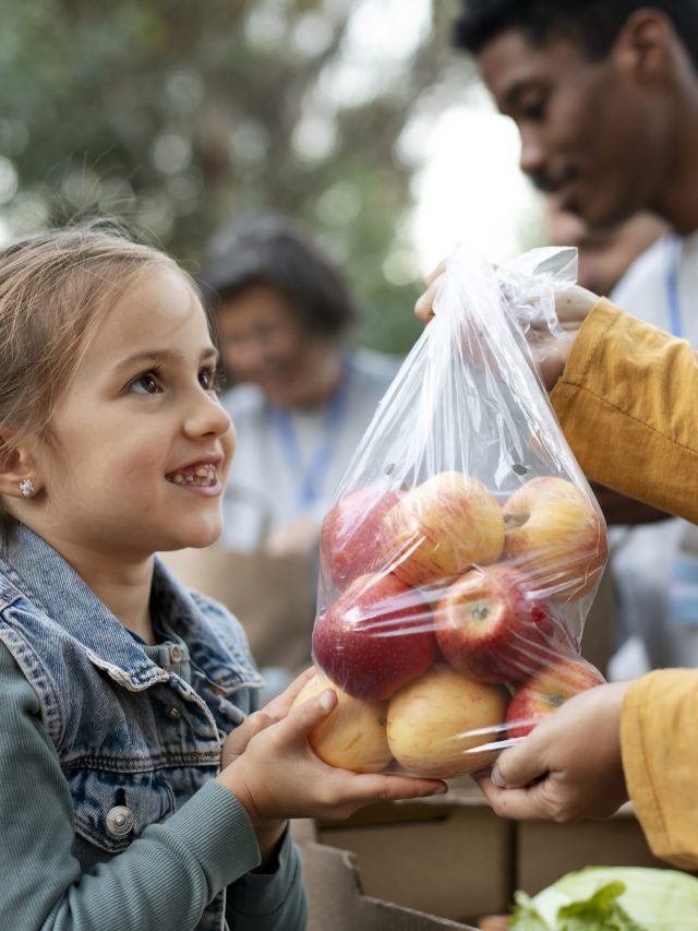 close-up-people-holding-apples-bag